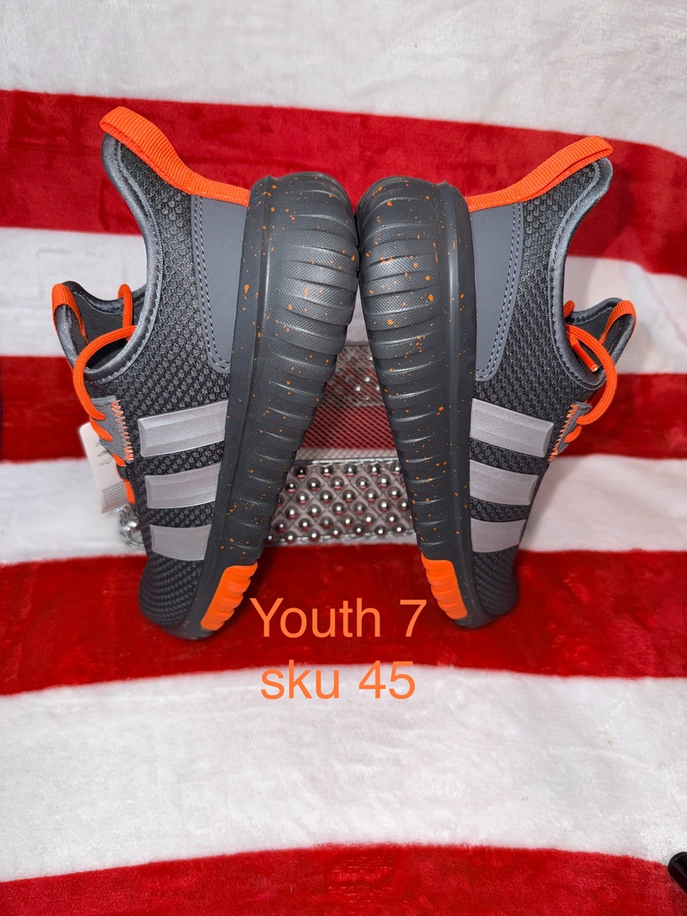 Adidas JP9254 Youth 7 Gray and Orange Slip-On Sneakers. Also a 6 is available.